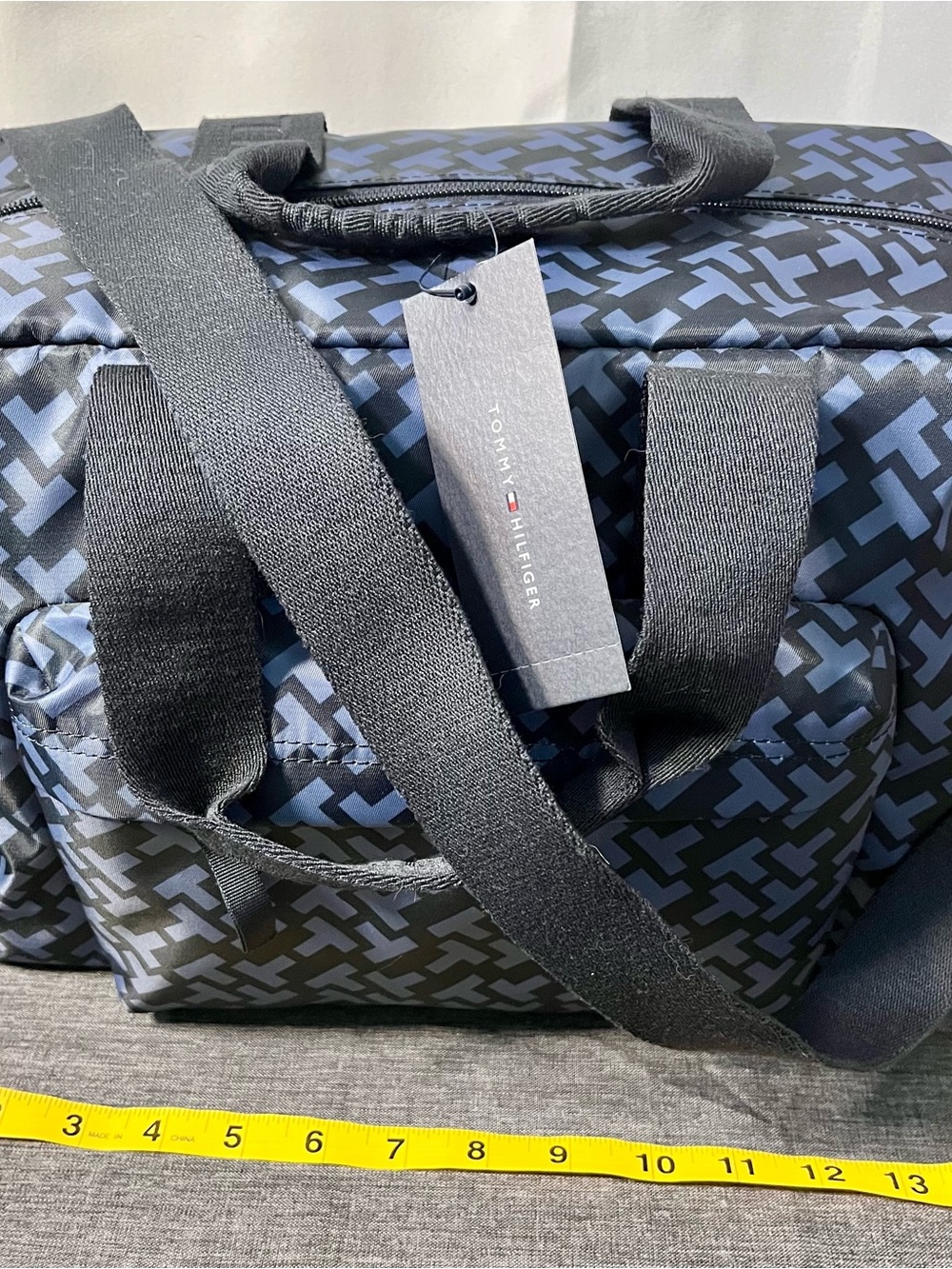 NWT Tommy Hilfiger Navy and Black Geometric Duffel Bag retail tag: $148